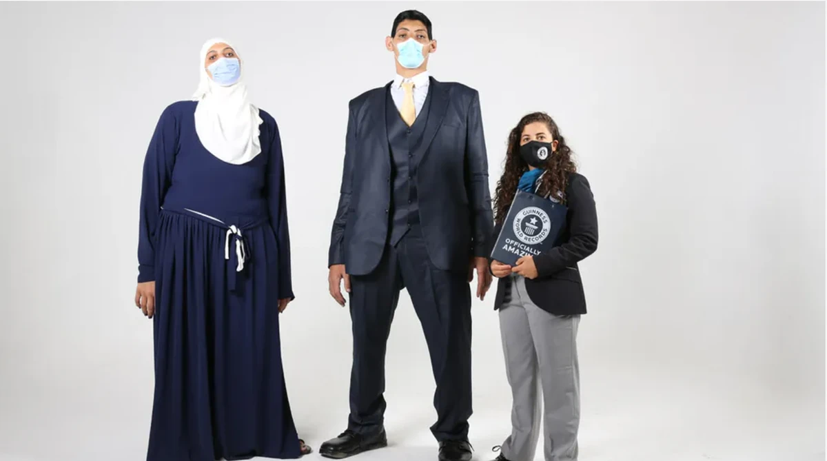 Huda, as well as her brother Mohammed Abdel-Gawad, have been bullied for their physical appearance due to a defect in their pituitary glands. (Guinness World Records)