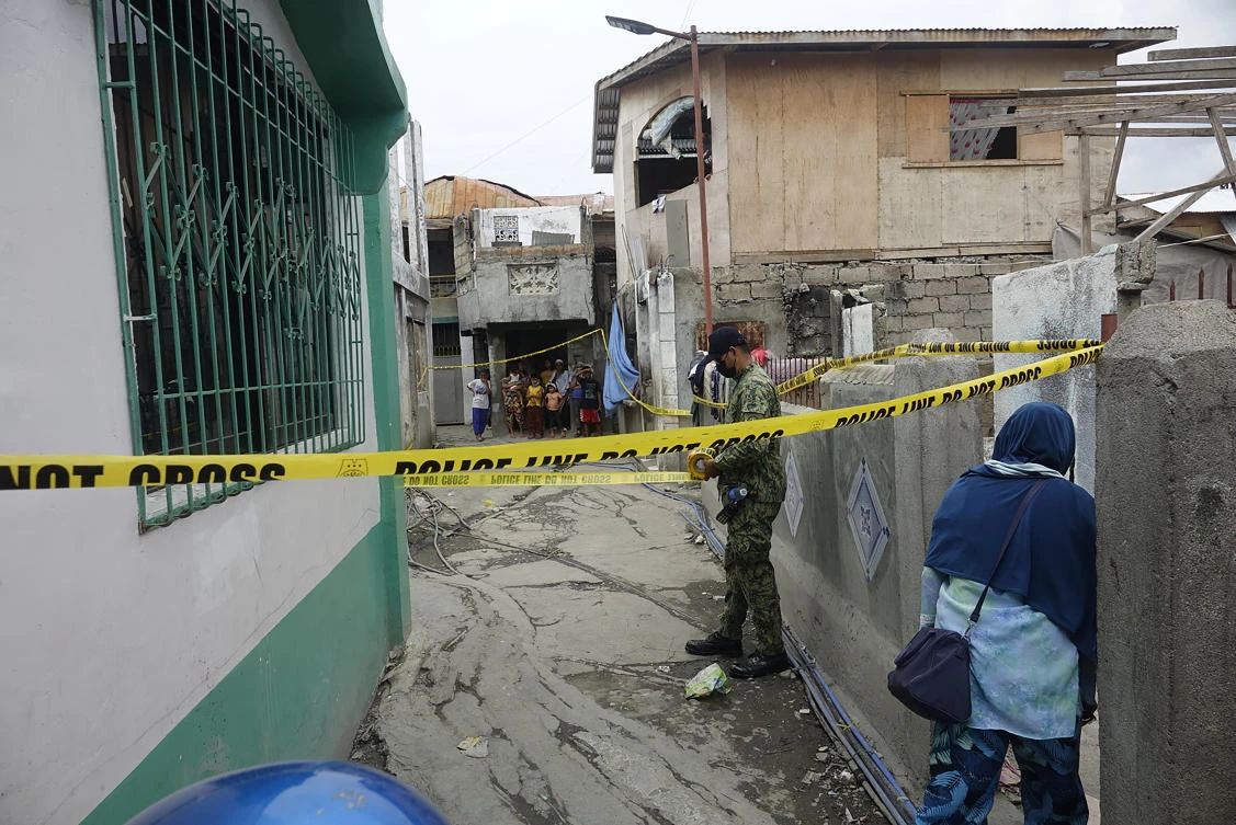 A bodyguard of the two mayors was wounded and a driver who came to pick them up was killed, police said. (AP)