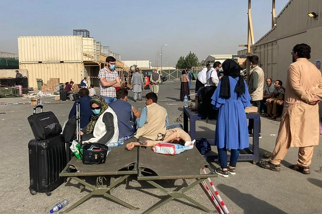 Thousands of residents descended on Kabul airport hoping to be evacuated after the Taliban took over Afghanistan on August 15. (AFP)