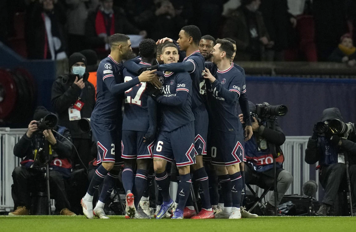 PSG players celebrate after Kylian Mbappe scored his side’s opening goal during their Champions League match against Club Brugge at the Parc des Princes stadium in Paris on Tuesday. (AP)