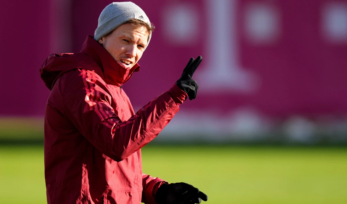 Bayern's head coach Julian Nagelsmann gestures as he arrives for a training session prior to the Champions League group E soccer match between Bayern Munich and FC Barcelona in Munich, Germany, Tuesday, Dec. 7, 2021. (AP)