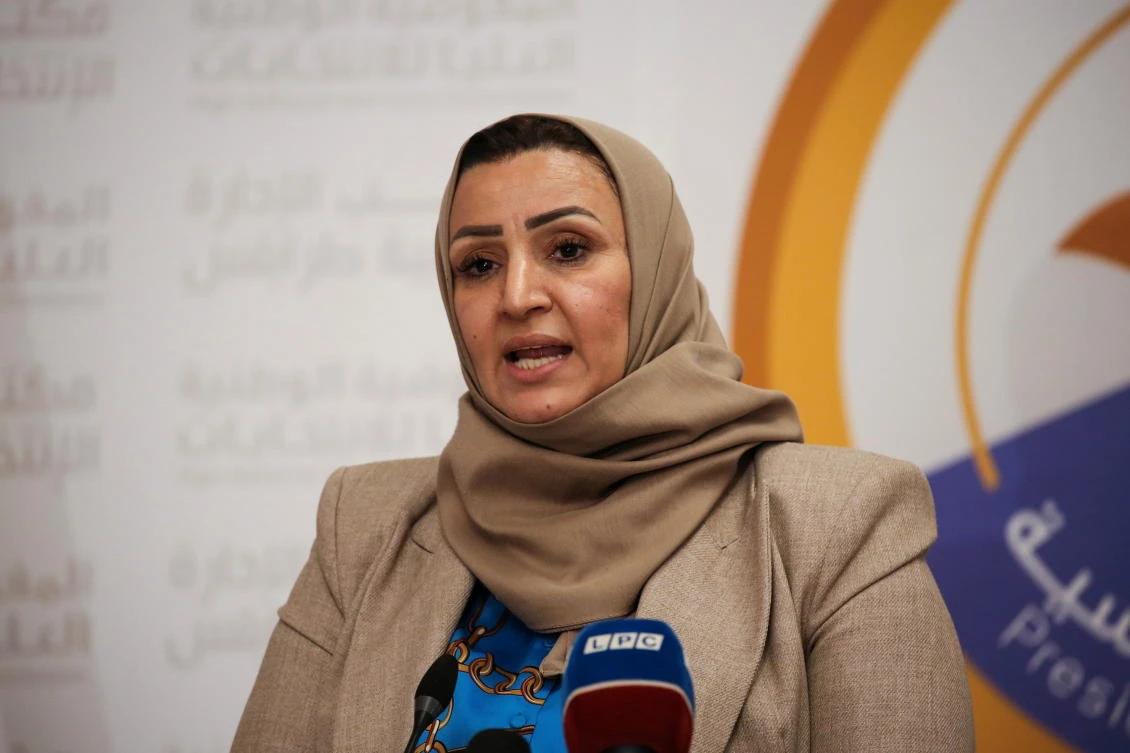 Laila Ben Khalifa, one of only two women to run for the first presidential elections, after submitting her candidacy papers for the upcoming presidential election at the headquarters of the electoral commission, in Tripoli in November. (Reuters)
