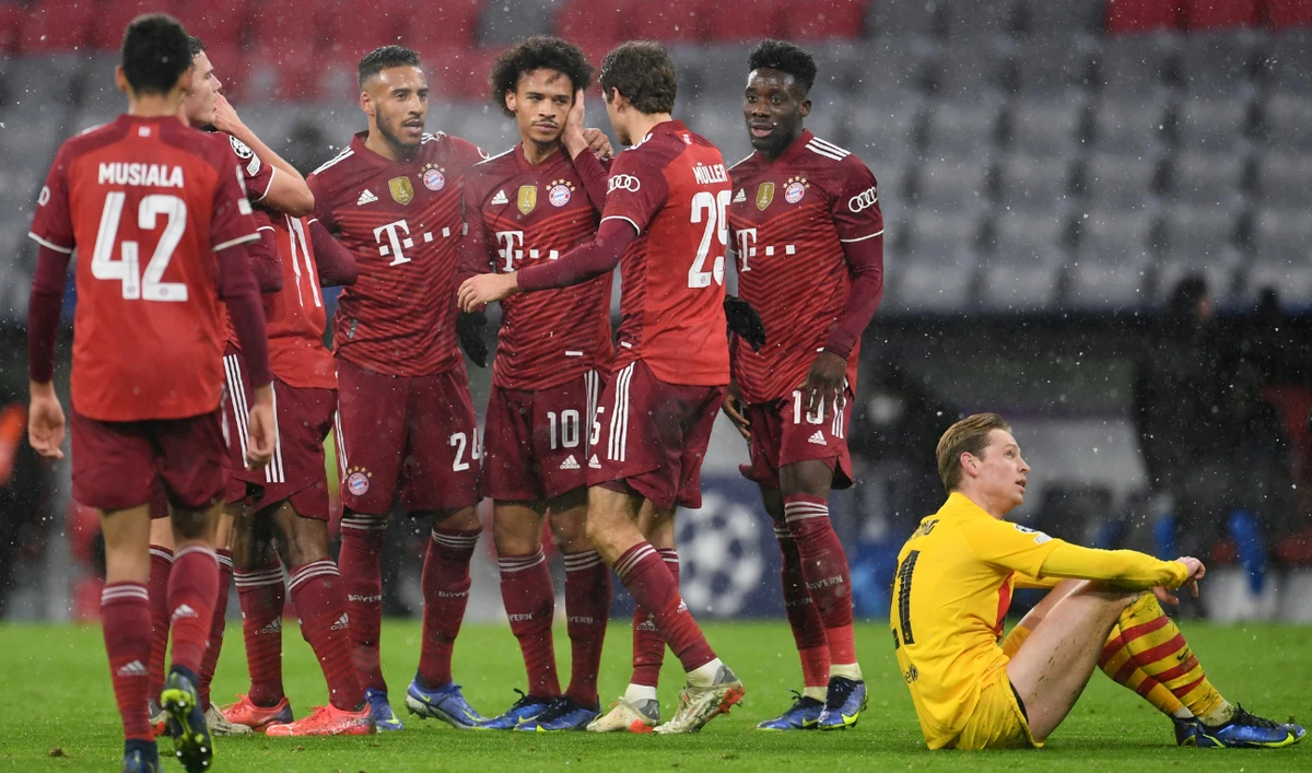 Bayern Munich's Leroy Sane celebrates scoring their second goal with teammates. (Reuters)