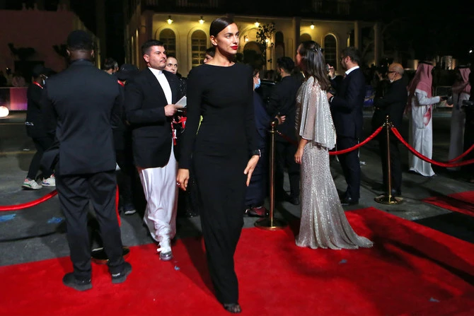 Russian model Irina Shayk arrives to the opening of the first edition of the Red Sea Film Festival in the Saudi city of Jeddah, on December 6, 2021. (AFP)