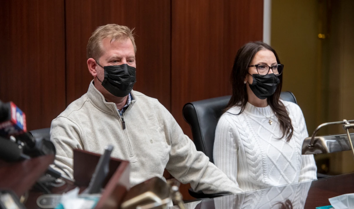 Jeffrey Franz and his wife Brandi listen as attorney Geoffrey Fieger holds a news conference at his offices in Southfield, Mich., on Thursday, Dec. 9, 2021. (AP)