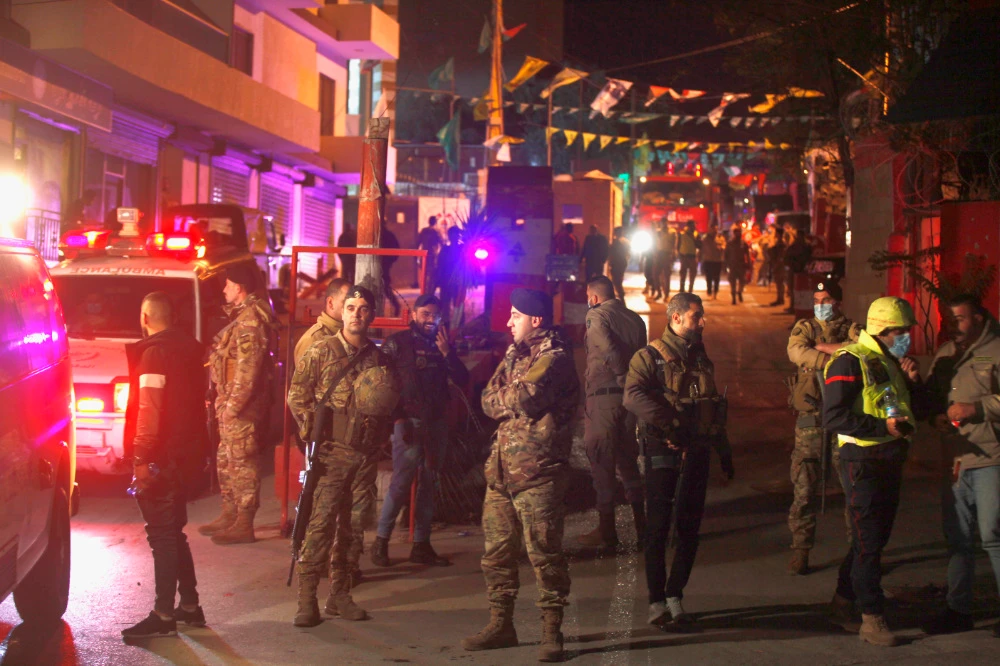 A number of armed Palestinian factions, including Hamas and the Fatah Movement, hold effective control over roughly a dozen Palestinian camps. (AP)