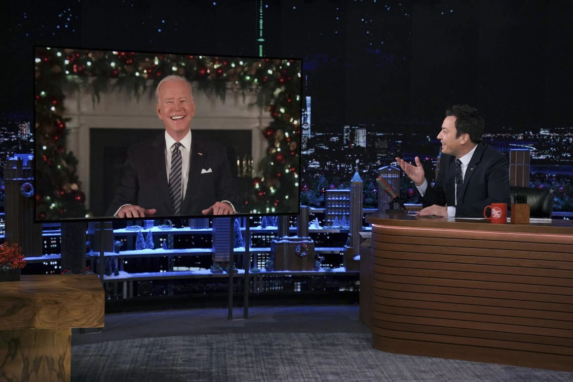 In this photo provided by NBC, President Joe Biden is shown on a screen during a virtual interview with host Jimmy Fallon on "The Tonight Show Starring Jimmy Fallon," Friday, Dec. 10, 2021, in New York. (AP)