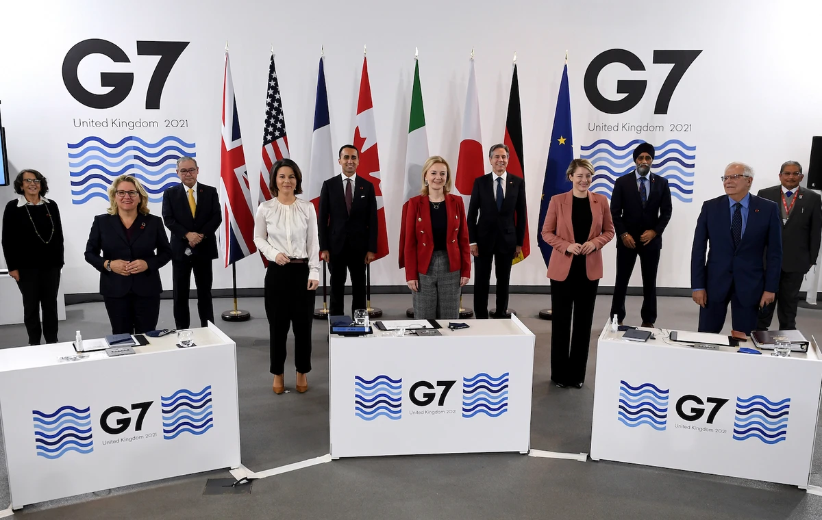 G7 Foreign and Development Ministers pose for a group photo in Liverpool, England Sunday, Dec. 12, 2021. (AFP)