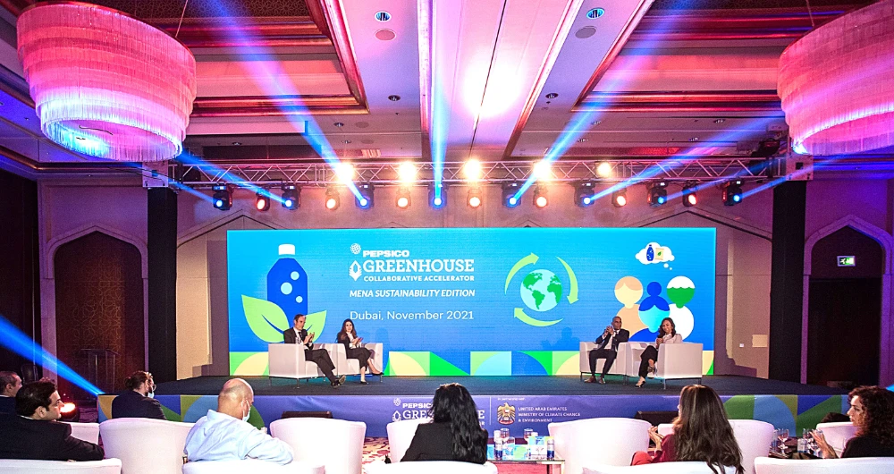 A panel discussion in progress to explore how to efficiently and effectively increase and support recycling projects.
