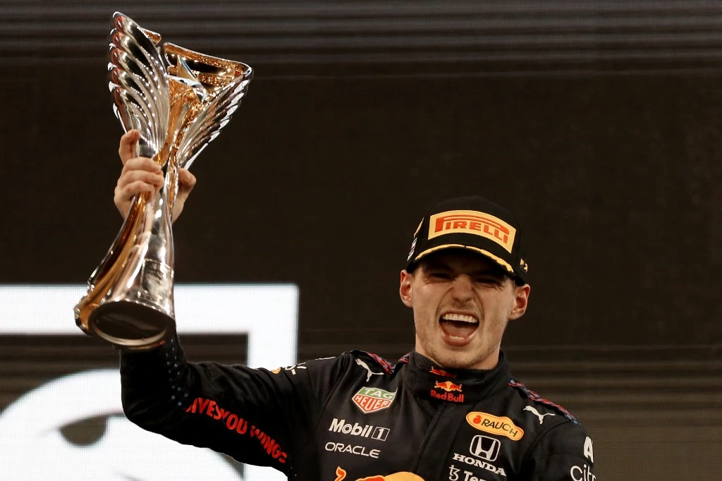 Red Bull’s Max Verstappen took his first Formula One title after winning the season-ending Abu Dhabi Grand Prix with a last lap overtake of rival Lewis Hamilton. (AFP)