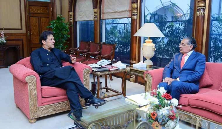 Pakistan’s Ambassador to the UN Munir Akram, right, with Prime Minister Imran Khan. (Facebook Photo)