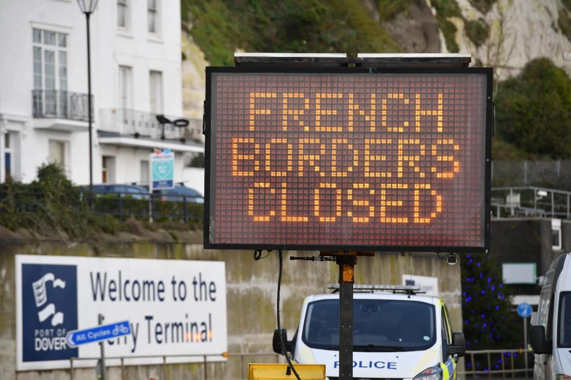 A sign informs drivers that the French border crossing is closed at the cordoned entrance to the ferry terminal at the Port of Dover in Kent, south east England. (File/AFP)