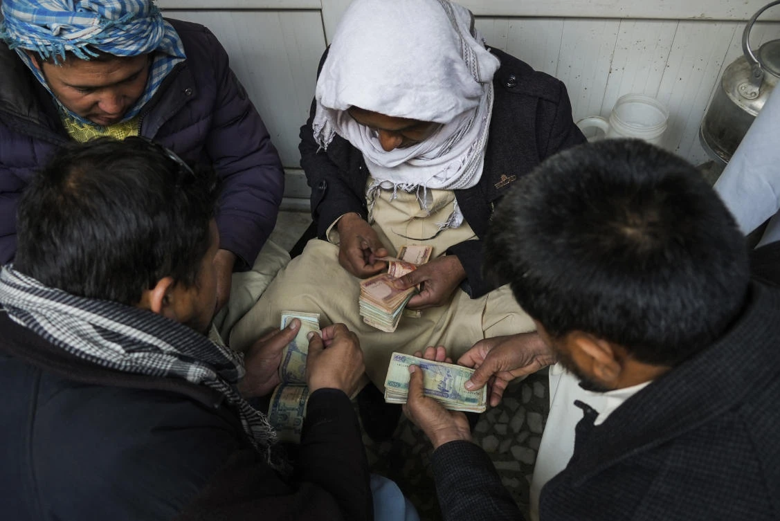 The local Afghan currency has been hammered since the Taliban’s return, particularly in the past week, slumping to 130 to the US dollar on Monday before recovering Friday to around 100. (AP)