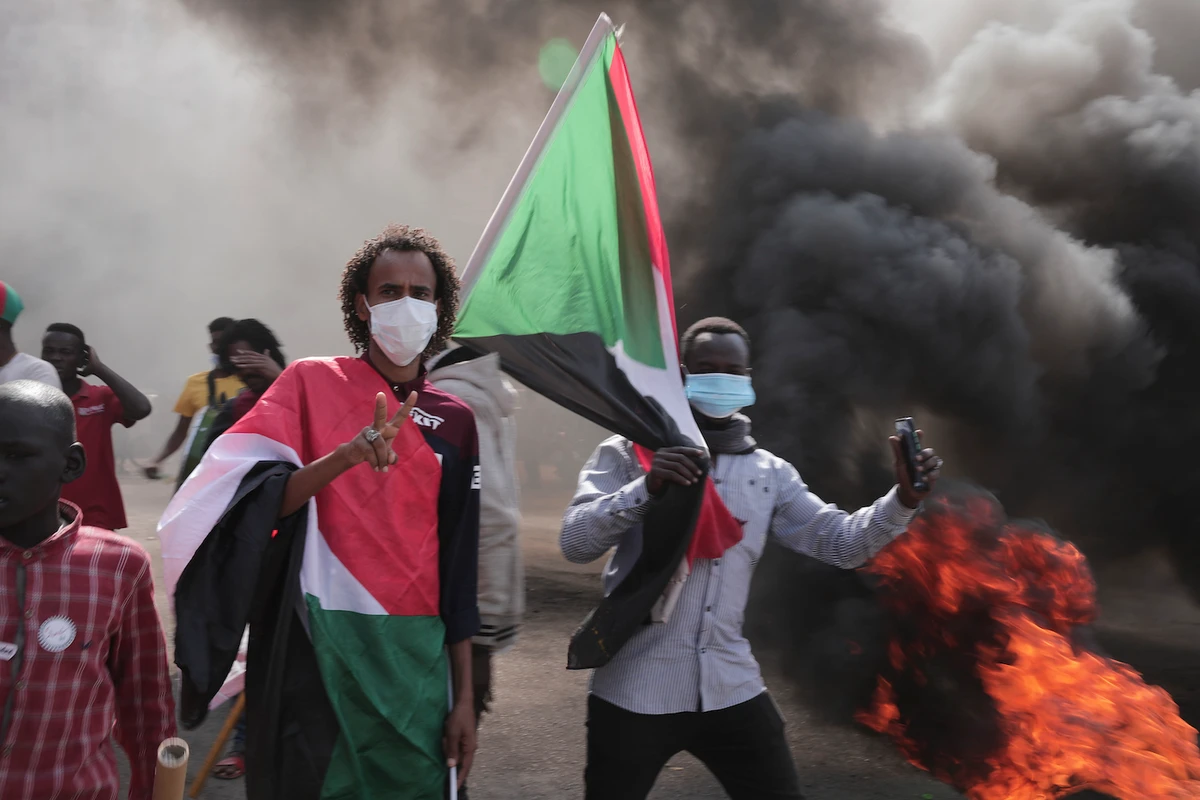 Sudan democracy protesters hit by tear gas and stun grenades