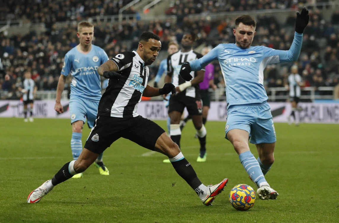 Manchester City's Aymeric Laporte in action with Newcastle United's Jamaal Lascelles at St James' Park, Newcastle, Britain on December 19, 2021. (Reuters)