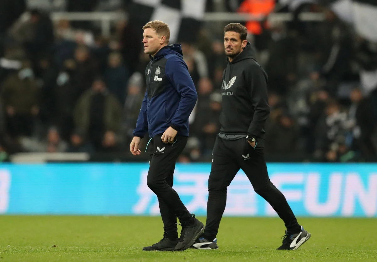 Newcastle United manager Eddie Howe and assistant manager Jason Tindall look dejected after their team's lopsided loss to Man City on Sunday. (REUTERS/Scott Heppell)