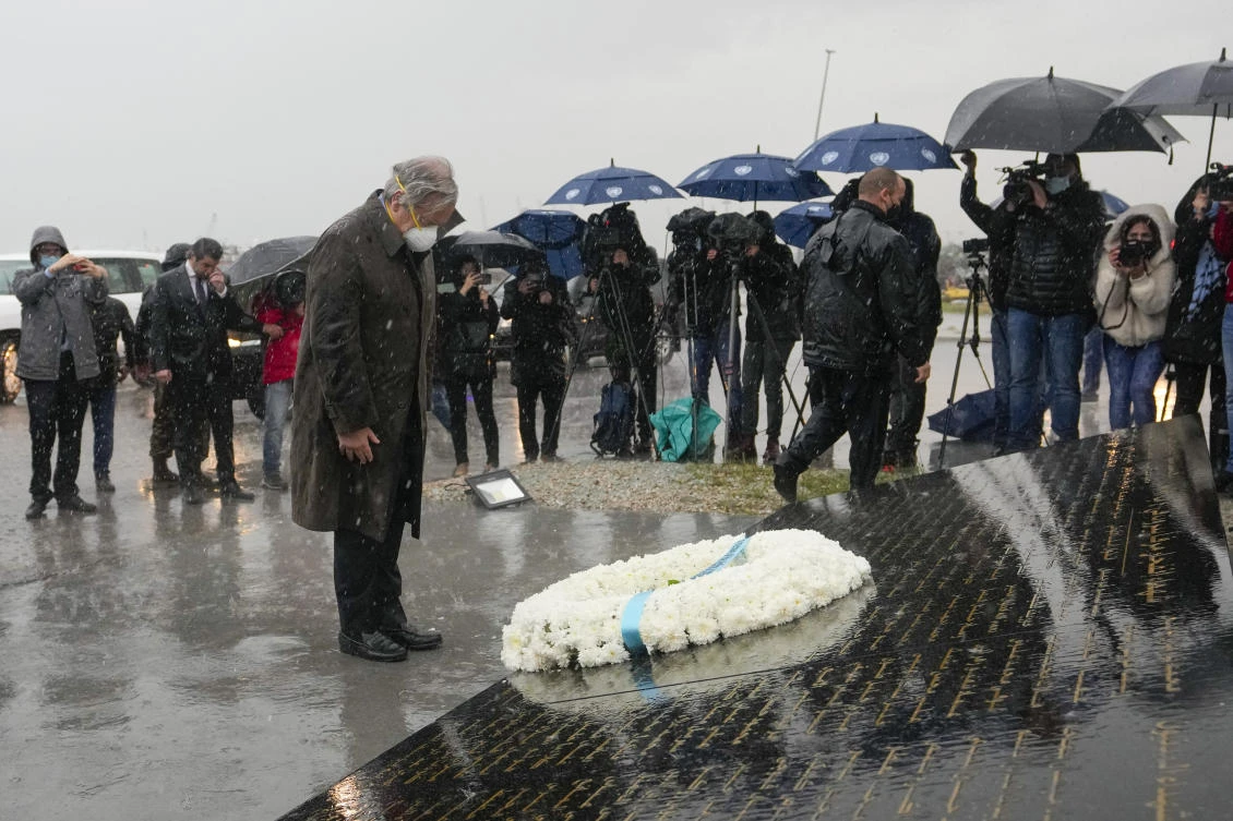 United Nations Secretary-General Antonio Guterres lays a wreath at Martyrs' statue at the damaged site of the massive Aug. 4 explosion that hit the seaport last year, in Beirut, Lebanon, Monday, Dec. 20, 2021. (AP)