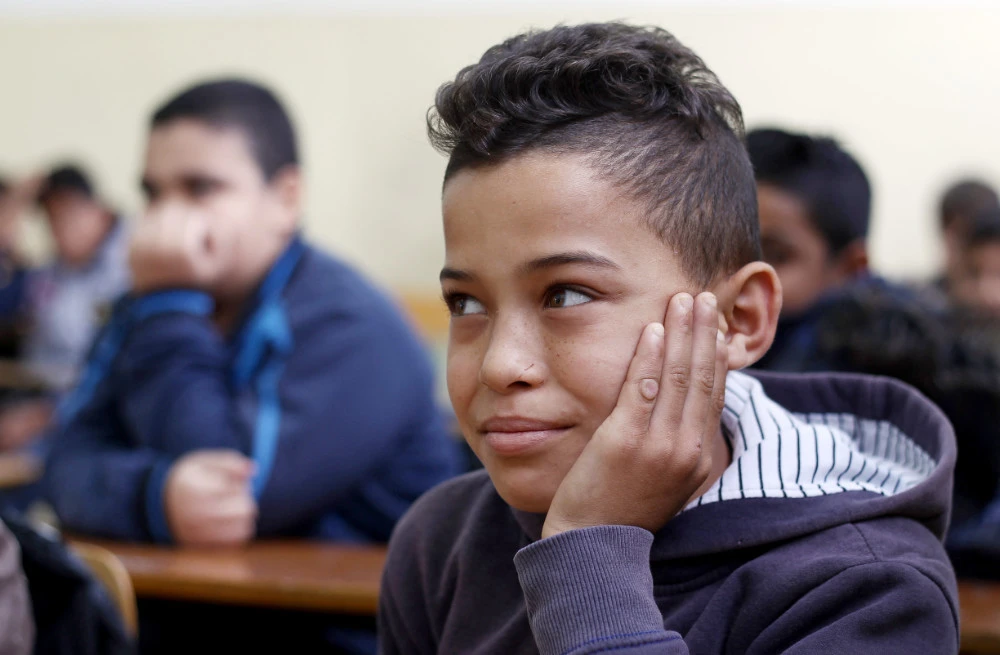 Libyan students attend a class at the al-Bashayer school in the eastern coastal city of Benghazi. (AFP file photo)