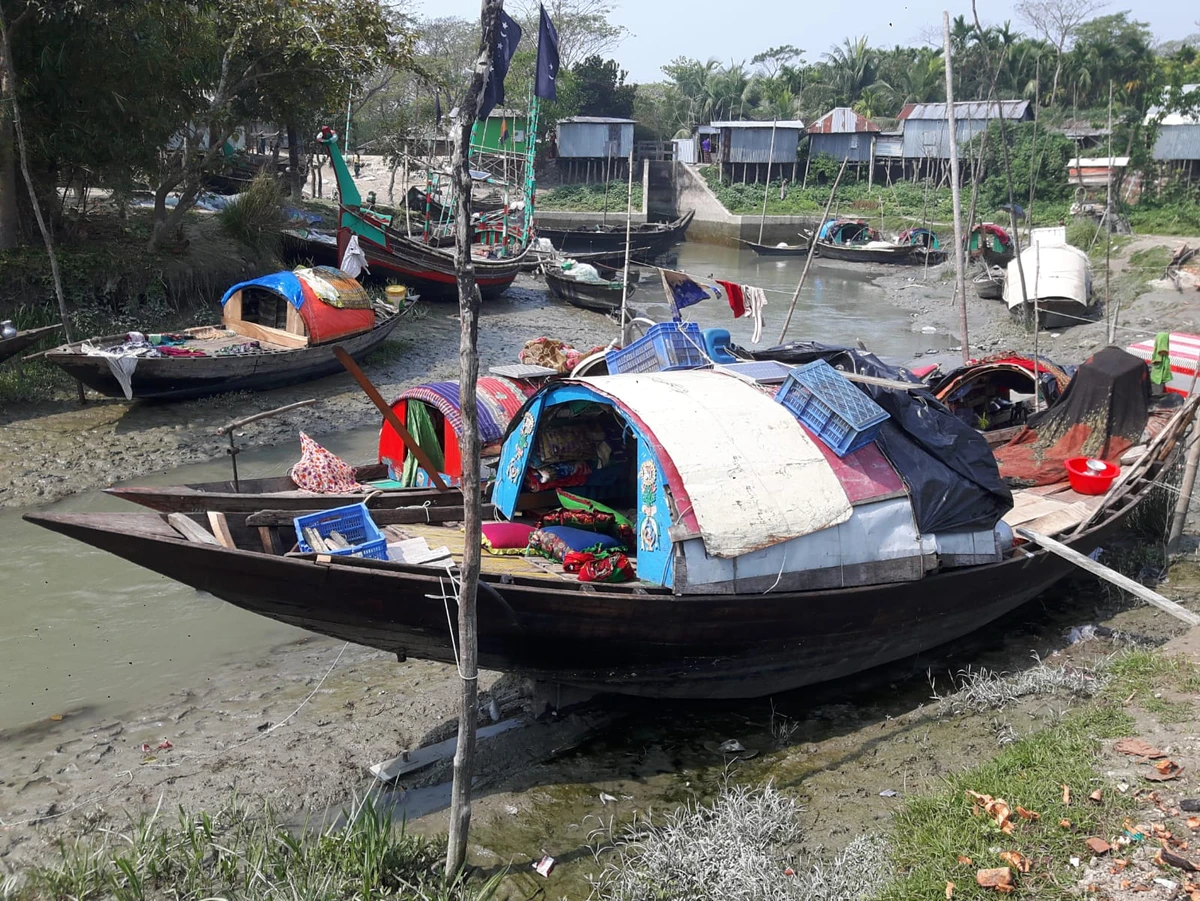 Boats belonging to landless fishermen are seen anchored in Bhola district, southern Bangladesh, in March 2019. (Photo credit: Zobaidur Rahman)
