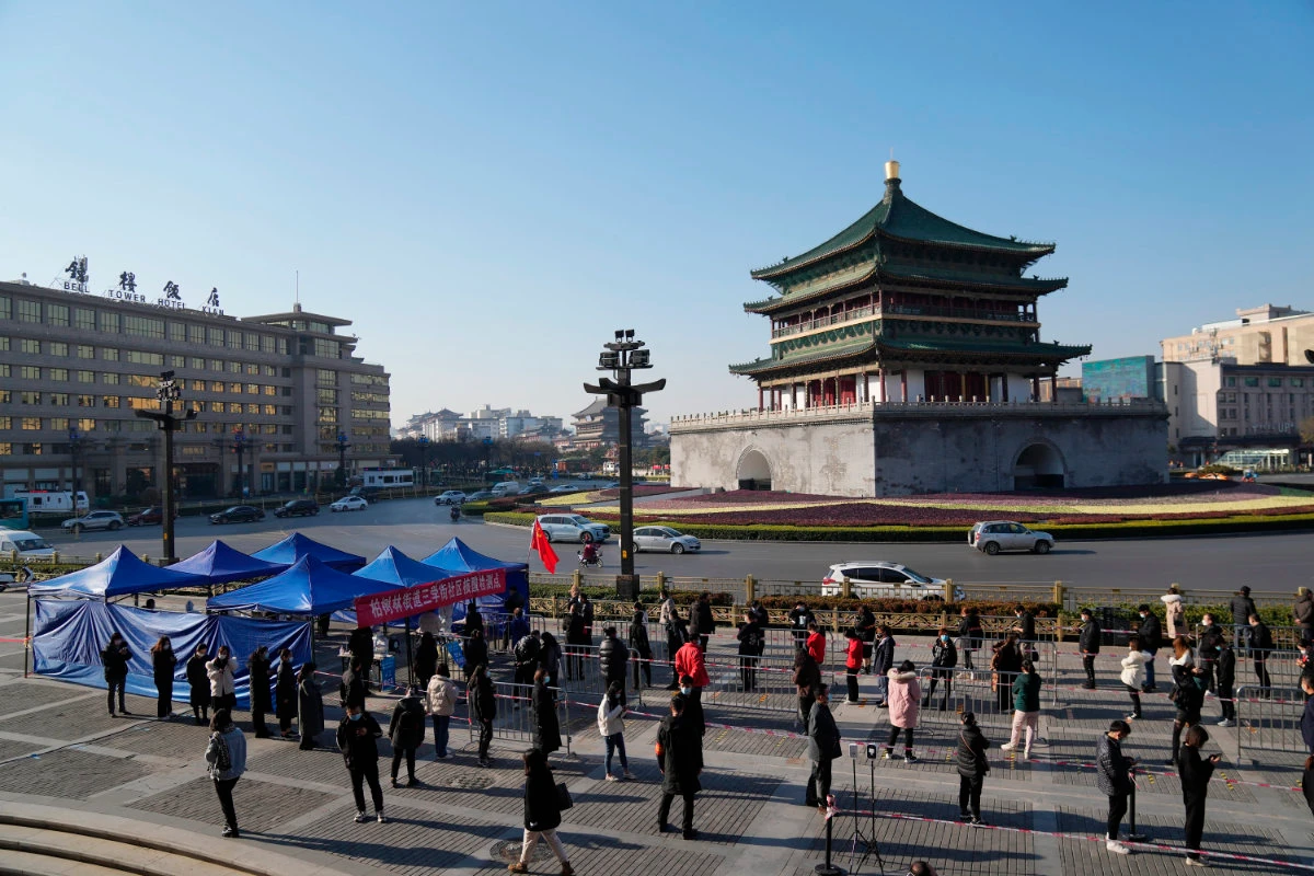China orders lockdown of up to 13 million people in Xi’an amid virus spike