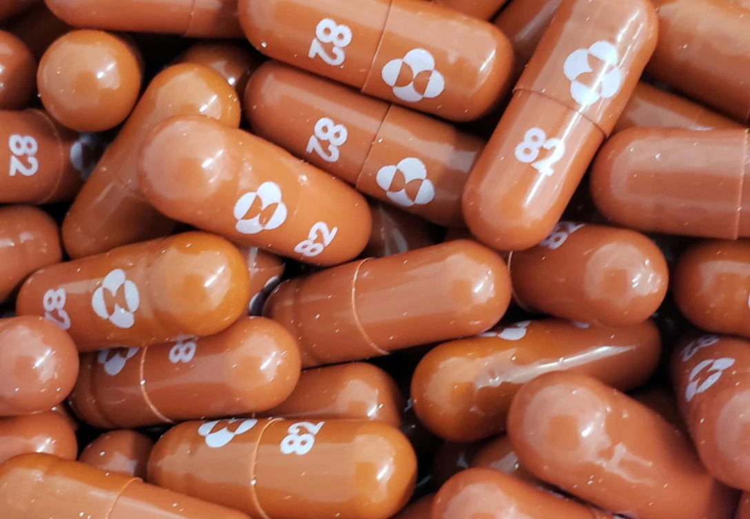 An experimental COVID-19 treatment pill, called molnupiravir and being developed by Merck & Co. Inc. and Ridgeback Biotherapeutics LP, is seen in this undated handout photo. (Reuters)