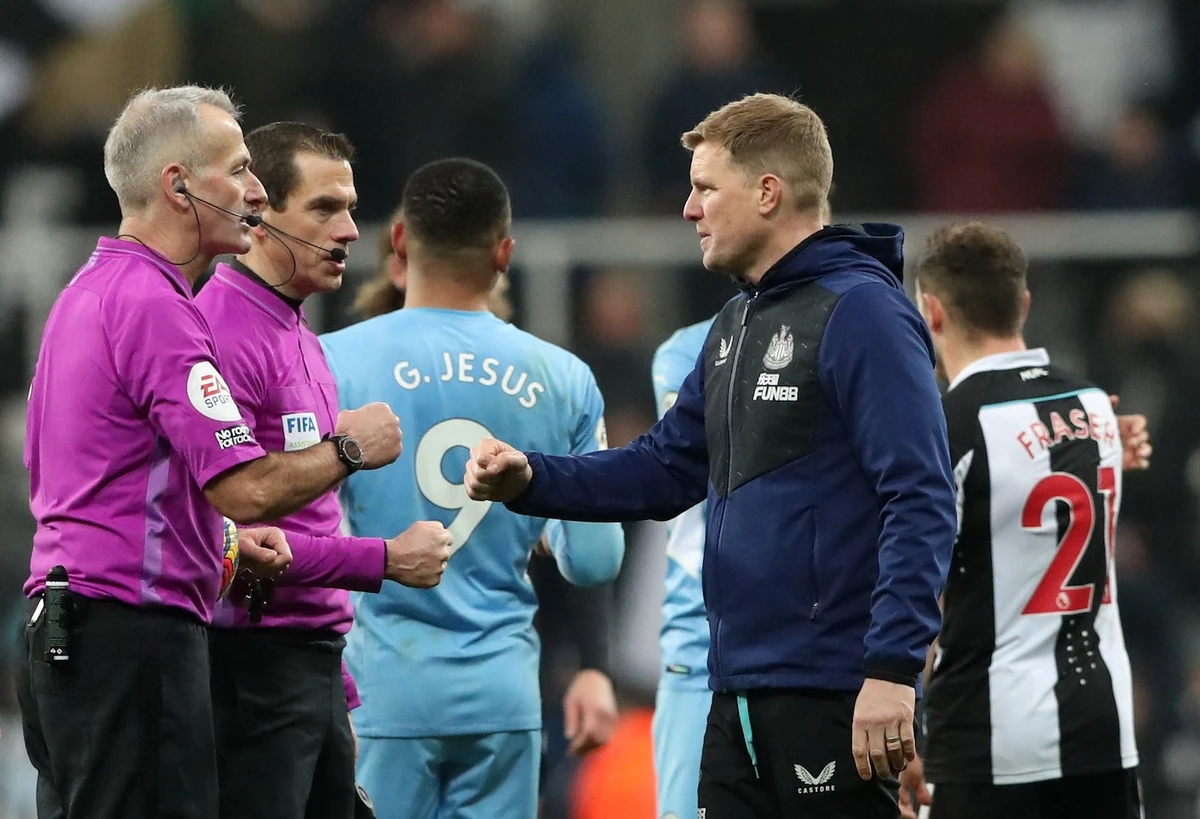 Newcastle United manager Eddie Howe shakes hands with referee Martin Atkinson after a Newcastle United v Manchester City match. (Reuters)
