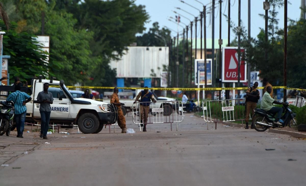 Burkina Faso gendarmes stand at a checkpost in Ouagadougou on August 14, 2017, a day after a deadly attack by gunmen on a restaurant the previous night. (File/AFP)