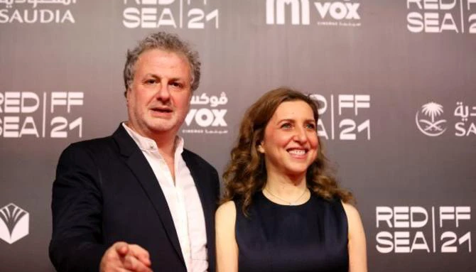 Lebanese filmmakers Khalil Joreige and Joana Hadjithomas on the red carpet before the screening of their film ‘Memory Box’ on the fourth day of the inaugural Red Sea International Film Festival in Jeddah. (AFP)