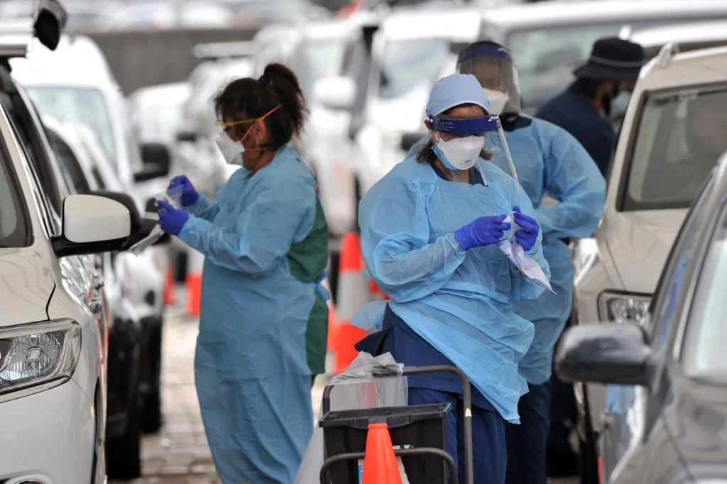New South Wales, the country’s most populous state, reported 6,324 new infections Monday. (AFP)