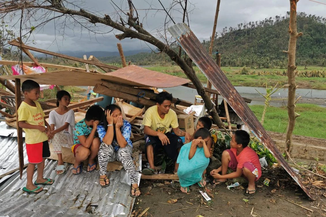 Typhoon Rai toppled power lines and trees and unleashed deadly floods that left hundreds of thousands homeless. (AFP)