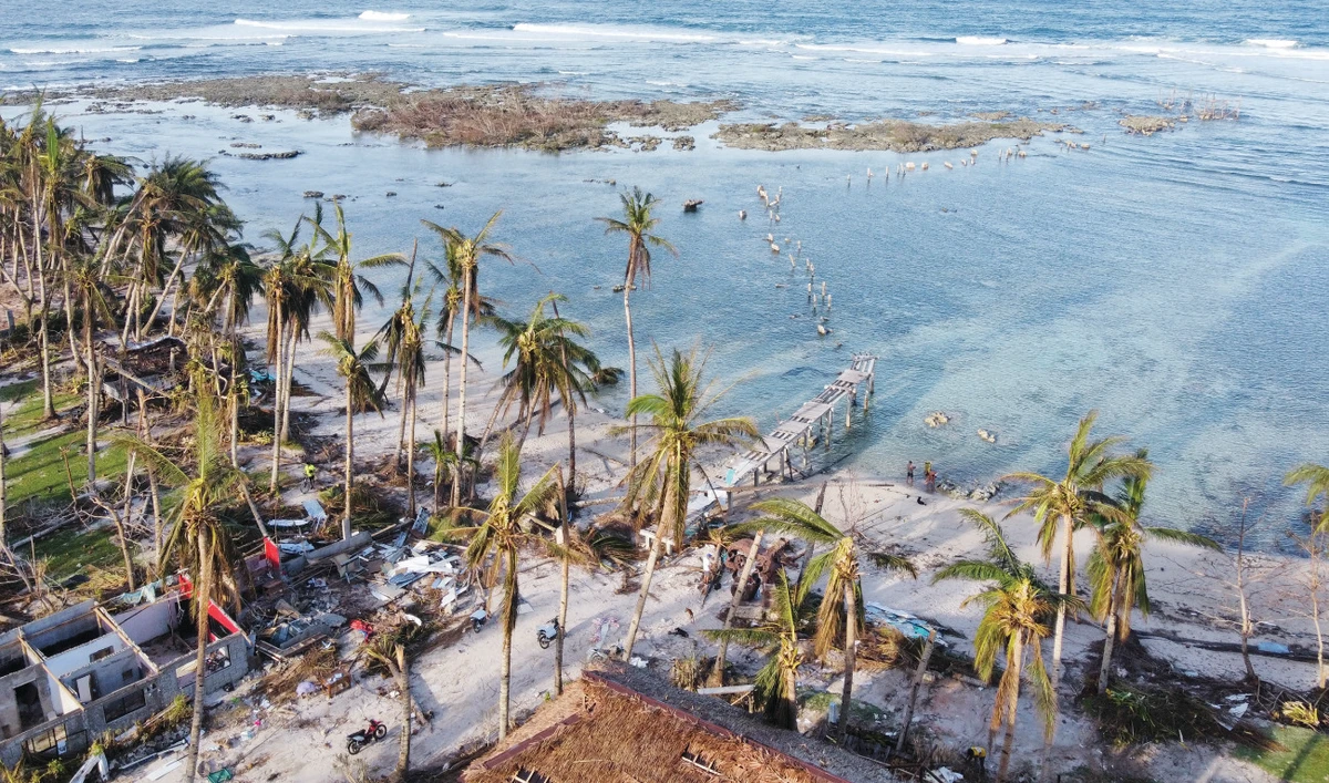 Remains of a damaged boardwalk caused by Typhoon Rai in Siargao island, Surigao del Norte. The death toll from the typhoon rose to 389. (AP)