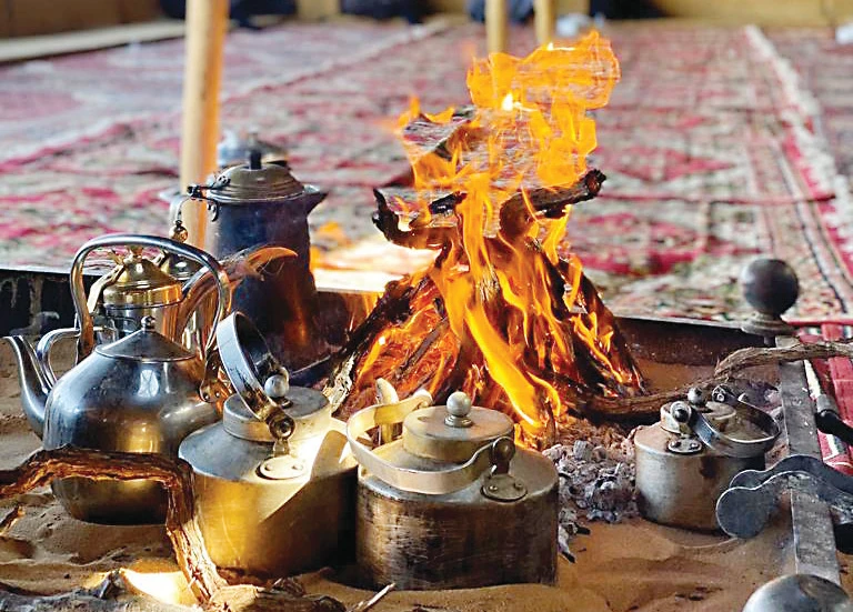 Campers in Saudi Arabia enjoy cool weather, host friends and families in nature