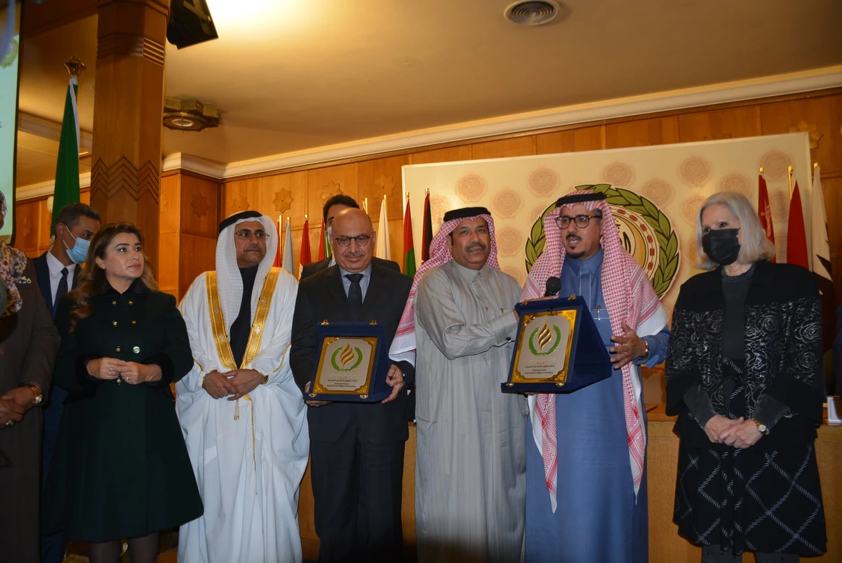Hadi Al-Yami, member of the Saudi Shoura Council and former president of the Arab League’s Human Rights Committee, was honored during a ceremony held on the sidelines of the committee’s 18 session in Kuwait. (Twitter/@ahrcommittee)