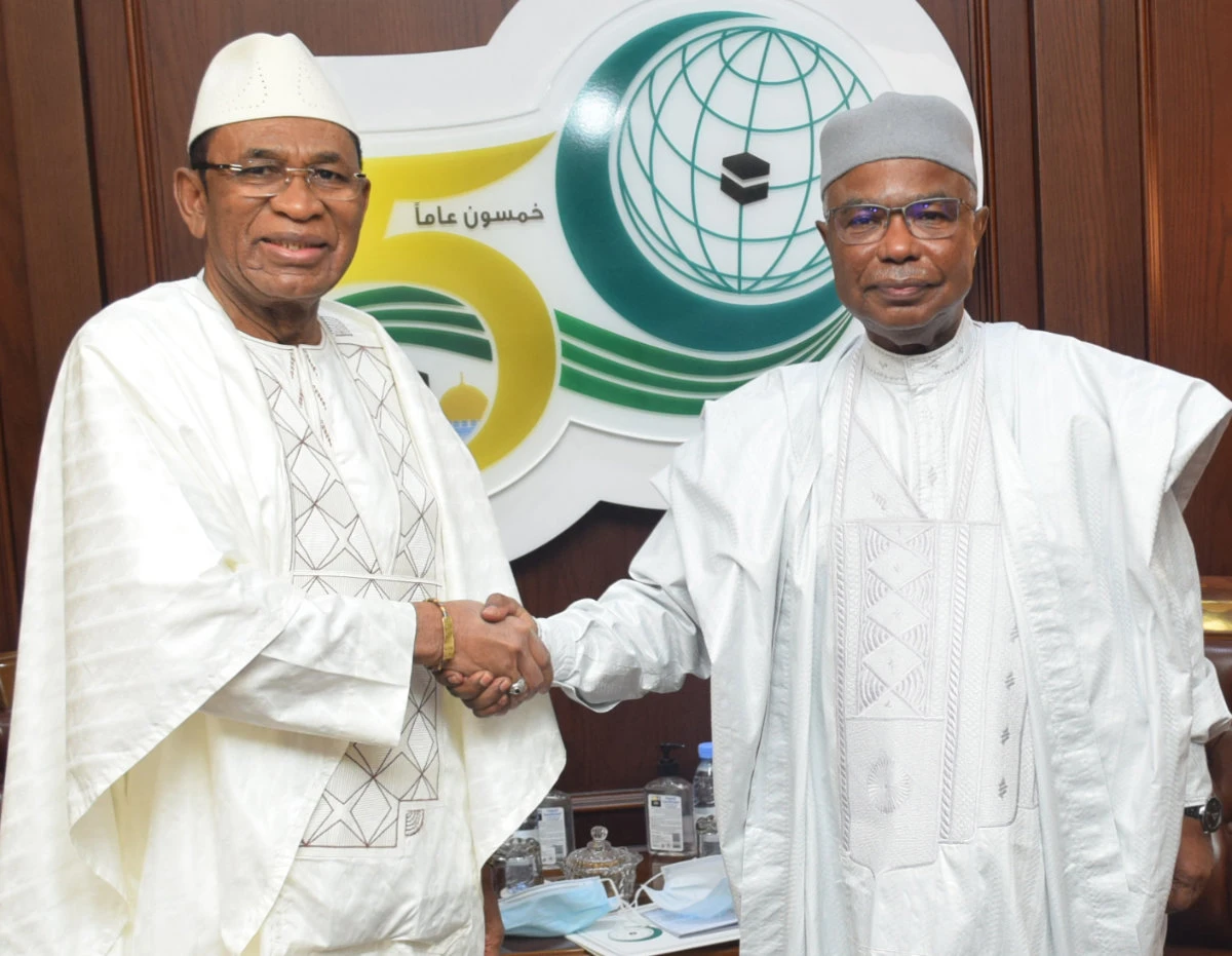 Gambian Ambassador Omar Gibril Salah meets the secretary-general of the Organization of Islamic Cooperation, Hissein Brahim Taha, in Jeddah. (SPA)