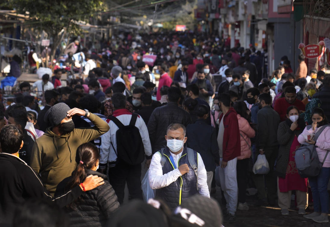 State authorities in India are finding it difficult to limit crowding in markets, religious sites and holiday destinations as they are allowed to remain open. (AP)