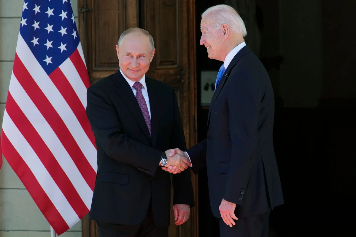 Vladimir Putin and Joe Biden shake hands at the Villa la Grange in Geneva, Switzerland, ahead of a US-Russia summit, June 16, 2021. (AP Photo)