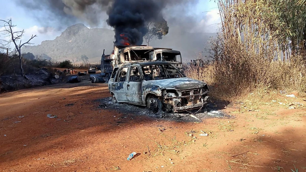 This image from the Karenni Nationalities Defense Force shows burnt vehicles in Hpruso township in Myanmar's Kayah state. (AFP)