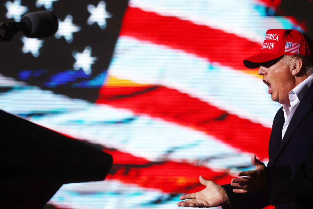 Former President Donald Trump prepares to speak at a rally at the Canyon Moon Ranch festival grounds on January 15, 2022 in Florence, Arizona. (AFP)