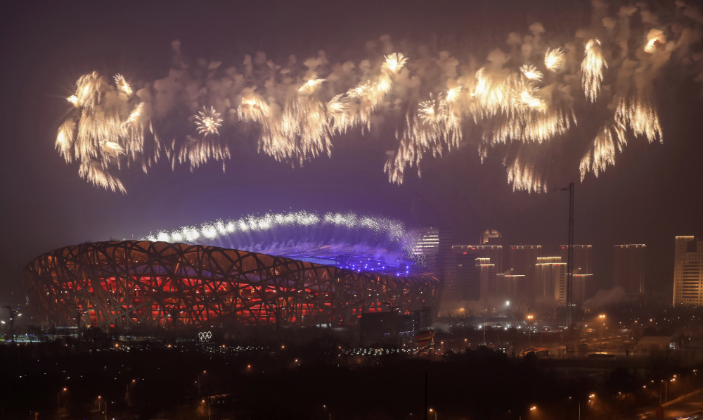 Fireworks are released during a rehearsal for the opening ceremony of the 2022 Winter Olympics at the iconic Bird's Nest National Stadium in Beijing, China, Sunday, Jan. 30, 2022. (AP)