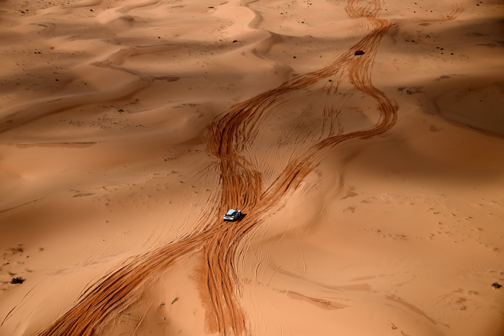 Competitors ride during Stage 3 of the Dakar Rally 2022 between the Saudi areas of al-Artawiya and al-Qaysumah, on January 4, 2022. (AFP)