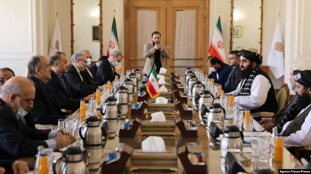 Iranian FM Hossein Amirabdollahian (2nd-L) meets with acting Taliban FM Amir Khan Muttaqi (R) in Tehran on Jan. 9, 2022. (Iran Foreign Ministry handout photo/AFP)