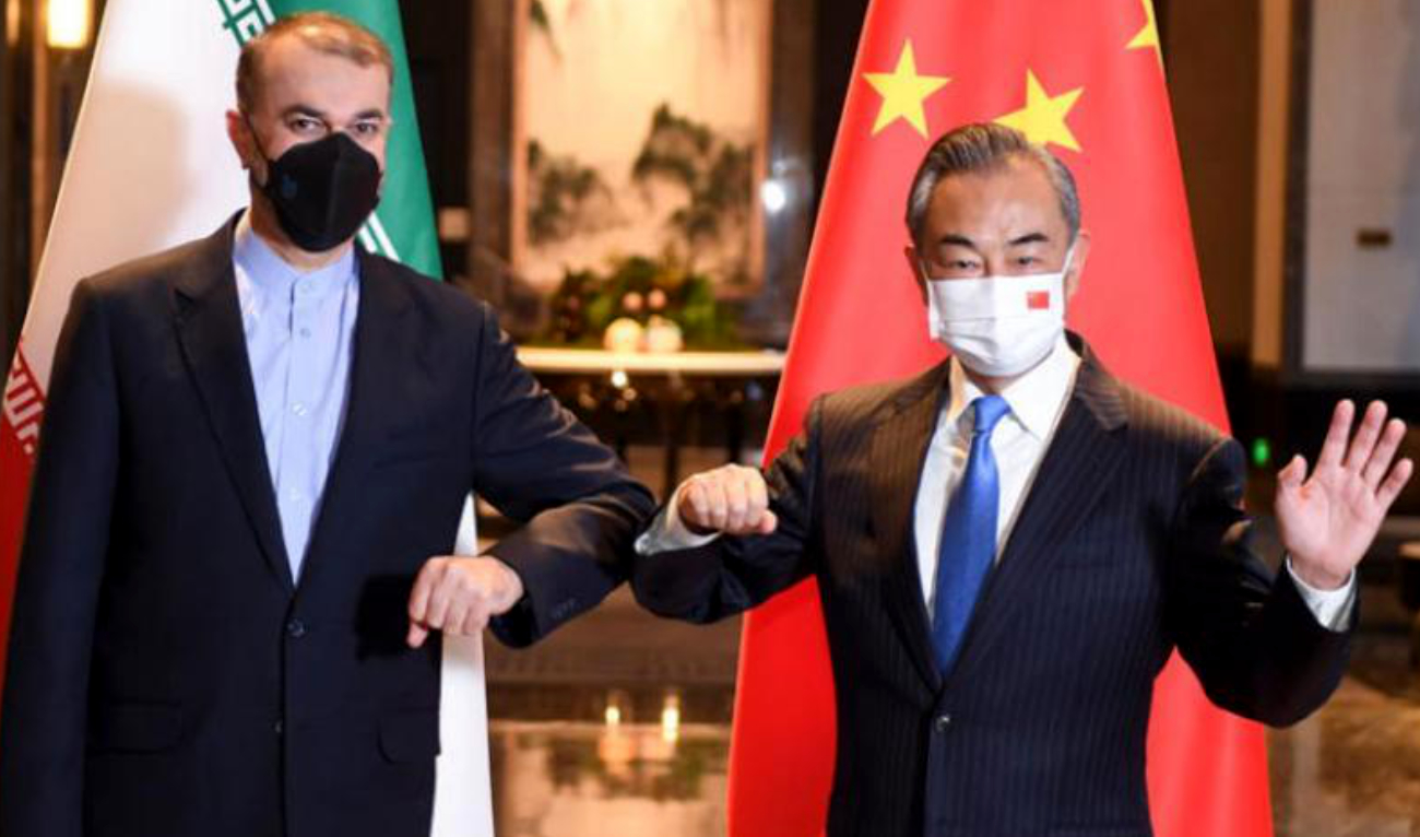 Chinese Foreign Minister Wang Yi and his Iranian counterpart Hossein Amirabdollahian. (AP)
