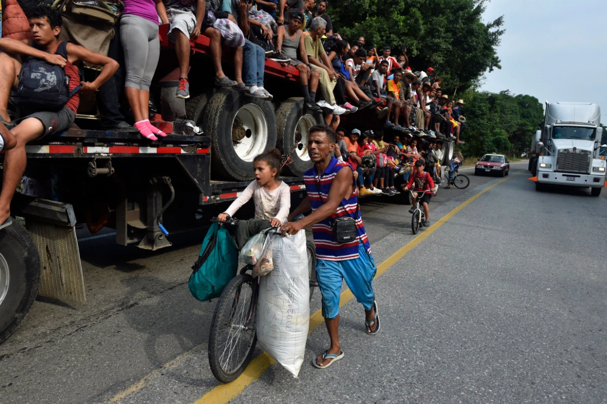 Migrants travel north in ‘caravans’ along dangerous routes through Latin and Central America. (AFP)