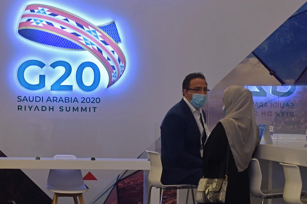 Journalists work in a media room setup for the coverage of the G20 summit in the Saudi capital Riyadh, on Nov. 20, 2020. (AFP)