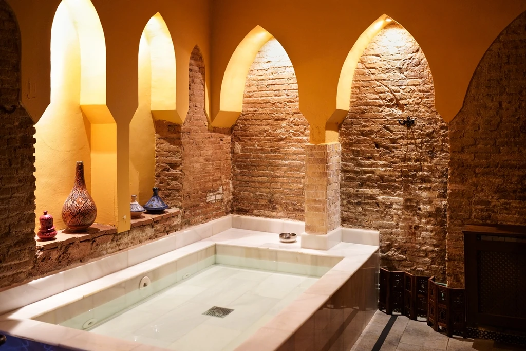 Aleppo’s ancient bathhouses are filling up again due to power cuts that have made hot showers a luxury. Bathhouses have for centuries served as a social hub where men come together to wash, listen to music and even eat. (Shutterstock)