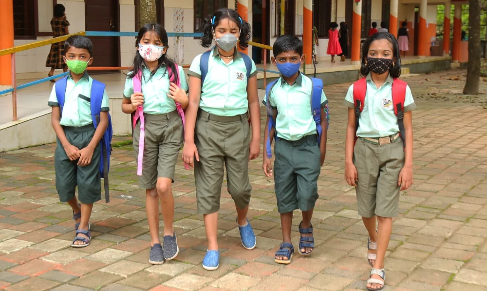 Girls and boys wear the same uniform at Valayanchirangara Primary School in Ernakulam district, Kerala state, southern India in November 2021. (Valayanchirangara Primary School)
