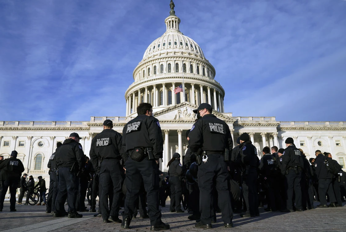 A large group of police arrive at the Capitol, Thursday, Jan. 6, 2022, in Washington. (AP)