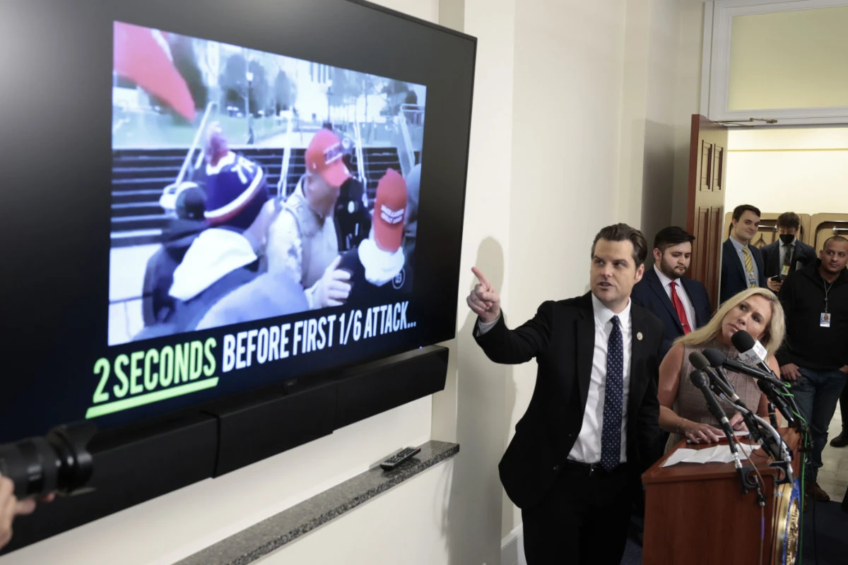 Republican congressmen Matt Gaetz (R-FL) and Marjorie watch of the January 6, 2021 attack on the US Capitol by supporters of then US President Donald Trump. (Getty Images/AFP)