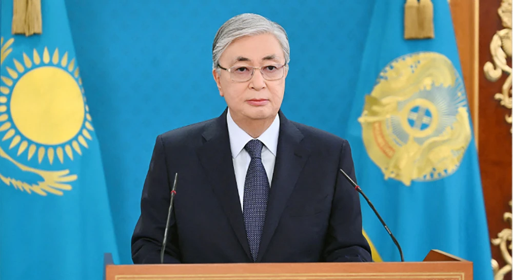 This handout image taken and released by the Kazakh presidential press service on January 7, 2022 shows Kazakh President Kassym-Jomart Tokayev making a public address in Alamaty. (AFP)