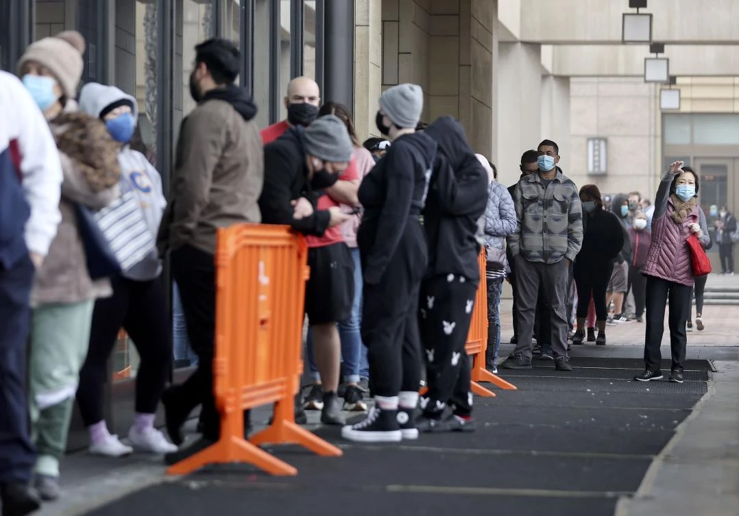 People wait in line to be tested for COVID-19 at Union Station on January 7, 2022 in Los Angeles, California. (AFP)